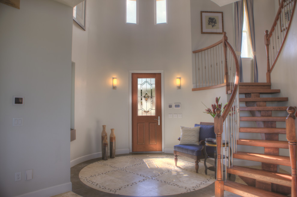 Design ideas for a mediterranean entrance in Other with white walls, a single front door and a medium wood front door.