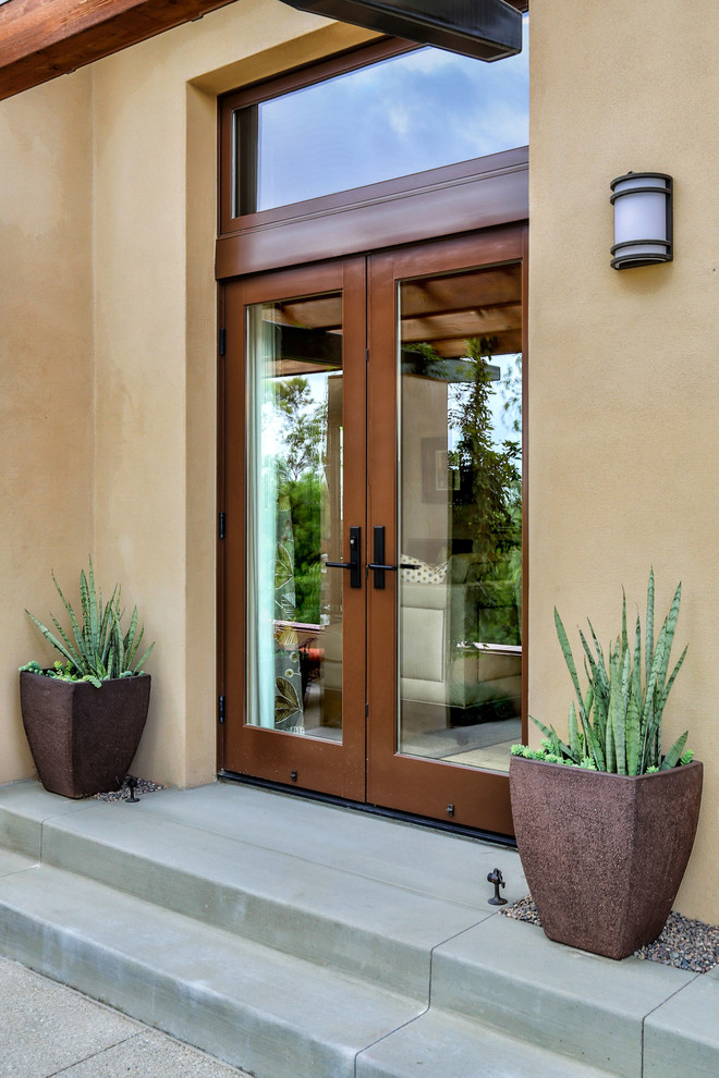 Mediterrane Haustür mit Doppeltür und Haustür aus Glas in Orange County