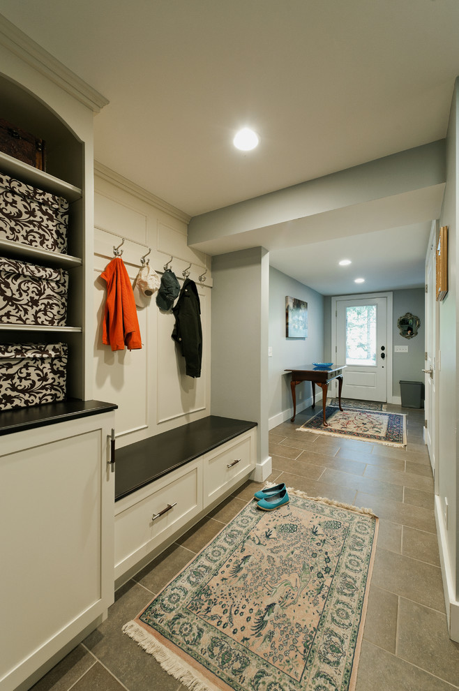 Photo of a traditional boot room in Boston with grey walls, a single front door and a white front door.