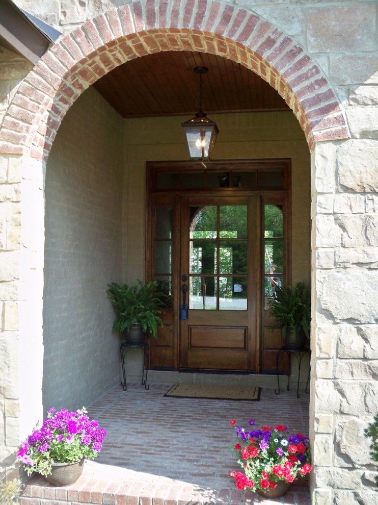 Mid-sized elegant entryway photo in Other with a brown front door