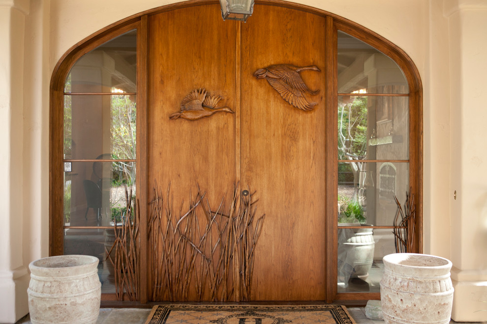 Photo of a traditional entrance in San Diego with a double front door.