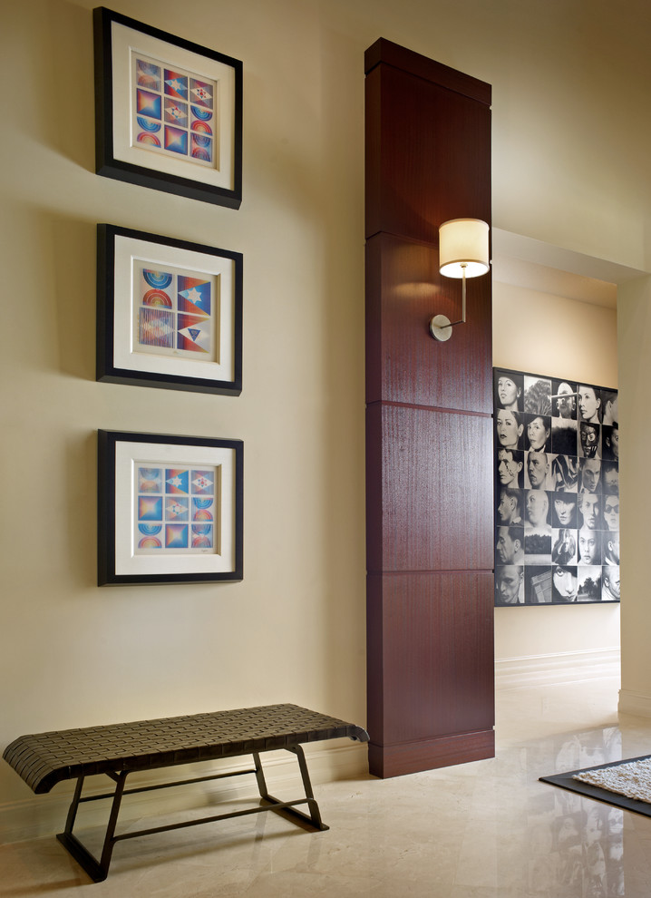 Inspiration for a contemporary entrance in Detroit with beige walls.