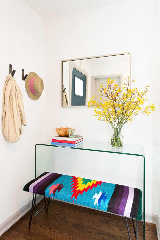 Inspiration for a small scandinavian dark wood floor entryway remodel in San Francisco with white walls