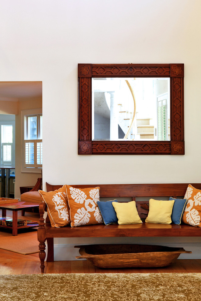 Beach style entry hall photo in New York with beige walls