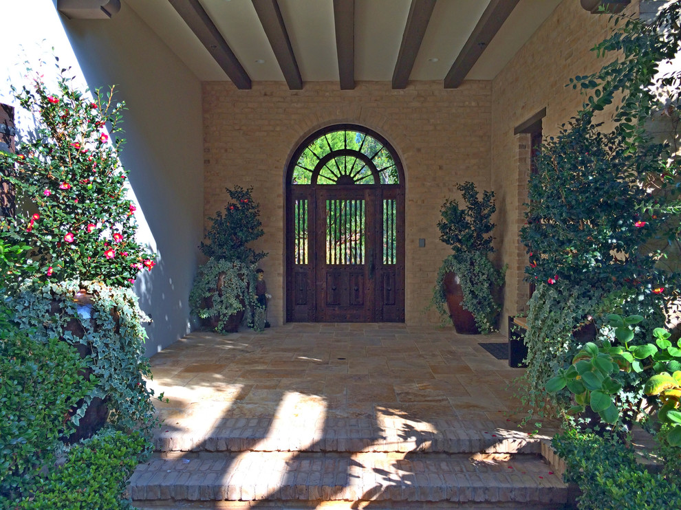 Inspiration for a mediterranean entrance in Orange County.