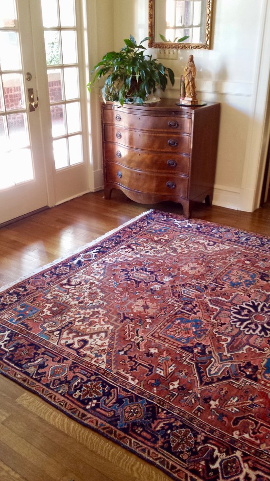 Antique Persian Heriz offers warm to foyer... traditional/classic Traditional Entry