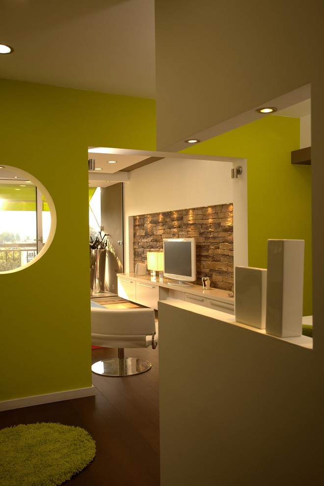 Inspiration for a contemporary entryway remodel in Other with green walls