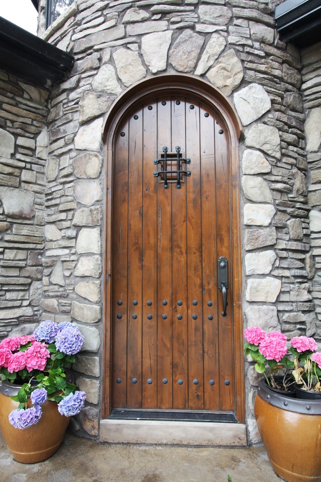 Arched Entry Door - Rustic - Entry - Cleveland - by Architectural