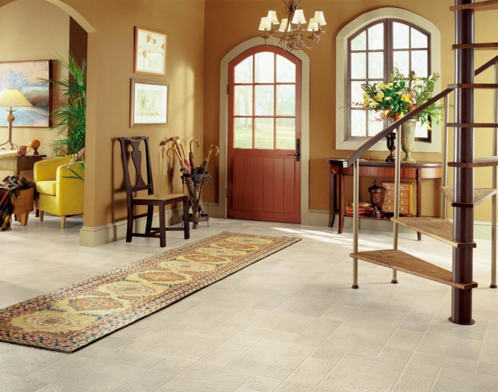 Design ideas for a large classic foyer in Other with brown walls, vinyl flooring, a single front door, a medium wood front door and grey floors.