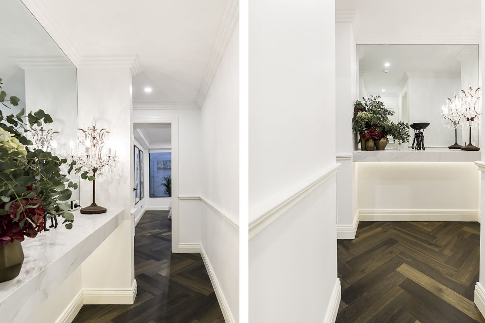 Inspiration for a modern entrance in Sydney with wainscoting.