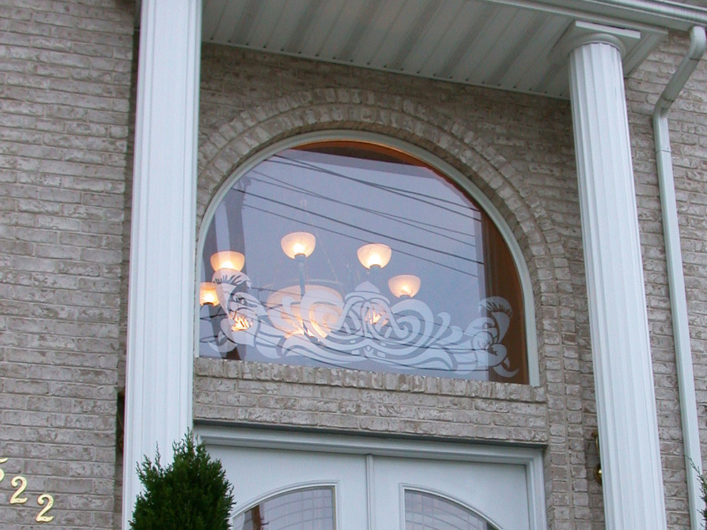 Foto di una porta d'ingresso contemporanea con una porta singola