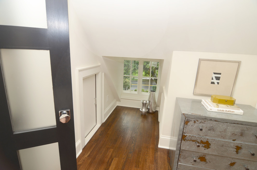 Entryway - mid-sized transitional medium tone wood floor and brown floor entryway idea in Atlanta with white walls and a gray front door
