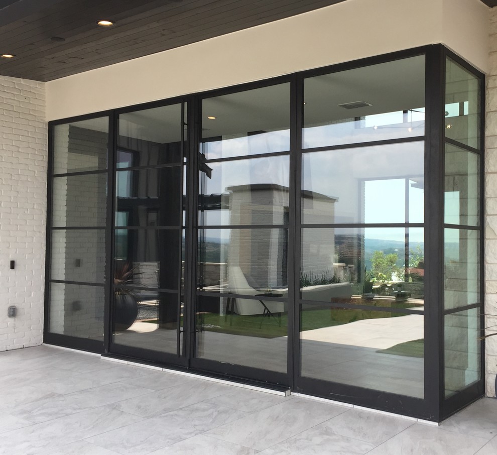 Example of a minimalist front door design in Austin