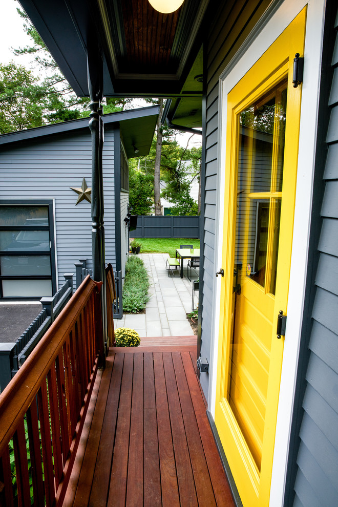 Mid-sized elegant entryway photo in Boston with a yellow front door