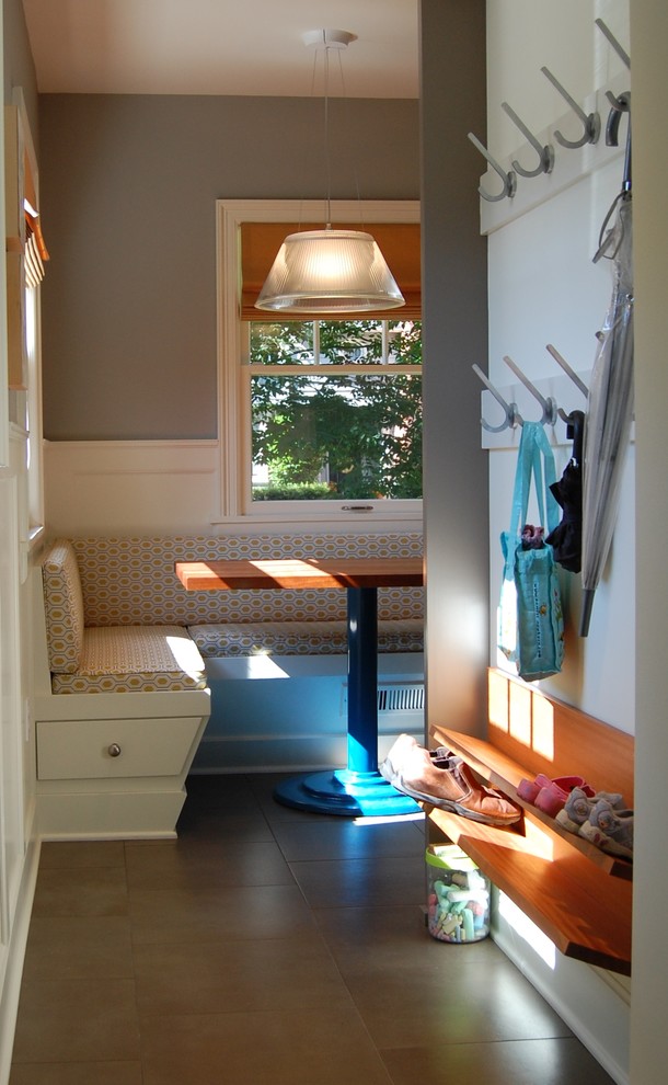 Transitional porcelain tile mudroom photo in Portland with gray walls