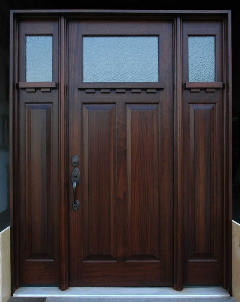 Photo of an expansive classic front door in Edmonton with a single front door and a dark wood front door.