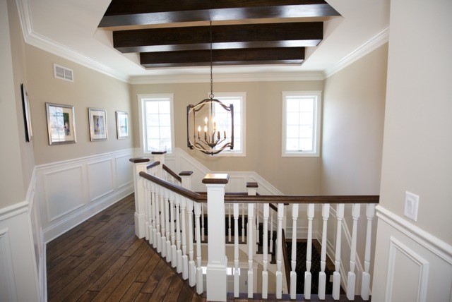 Photo of a large country foyer in Chicago with beige walls, medium hardwood flooring, a single front door, a white front door and beige floors.