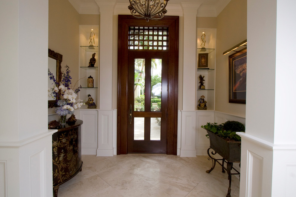 Mid-sized elegant slate floor and beige floor entryway photo in Tampa with beige walls and a medium wood front door