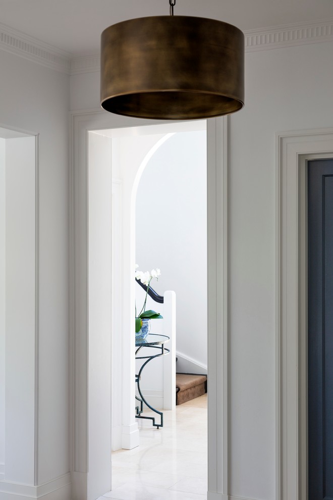 This is an example of a traditional entrance in Sydney with white walls.