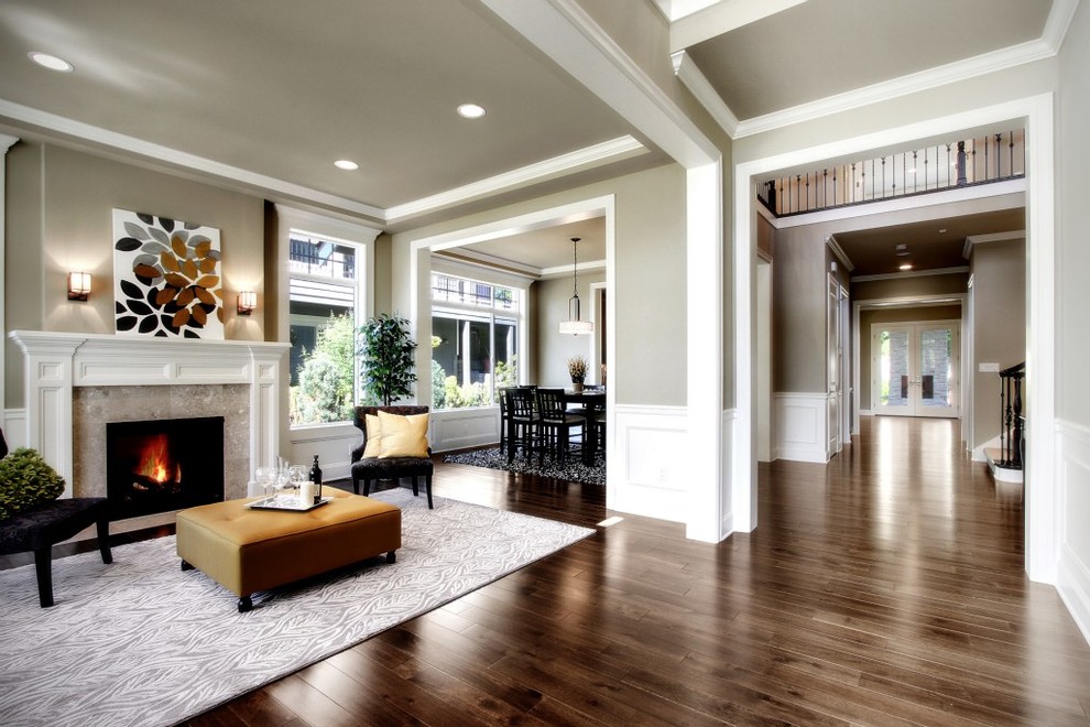 Design ideas for a large classic entrance in Seattle with beige walls, medium hardwood flooring, a single front door and a white front door.