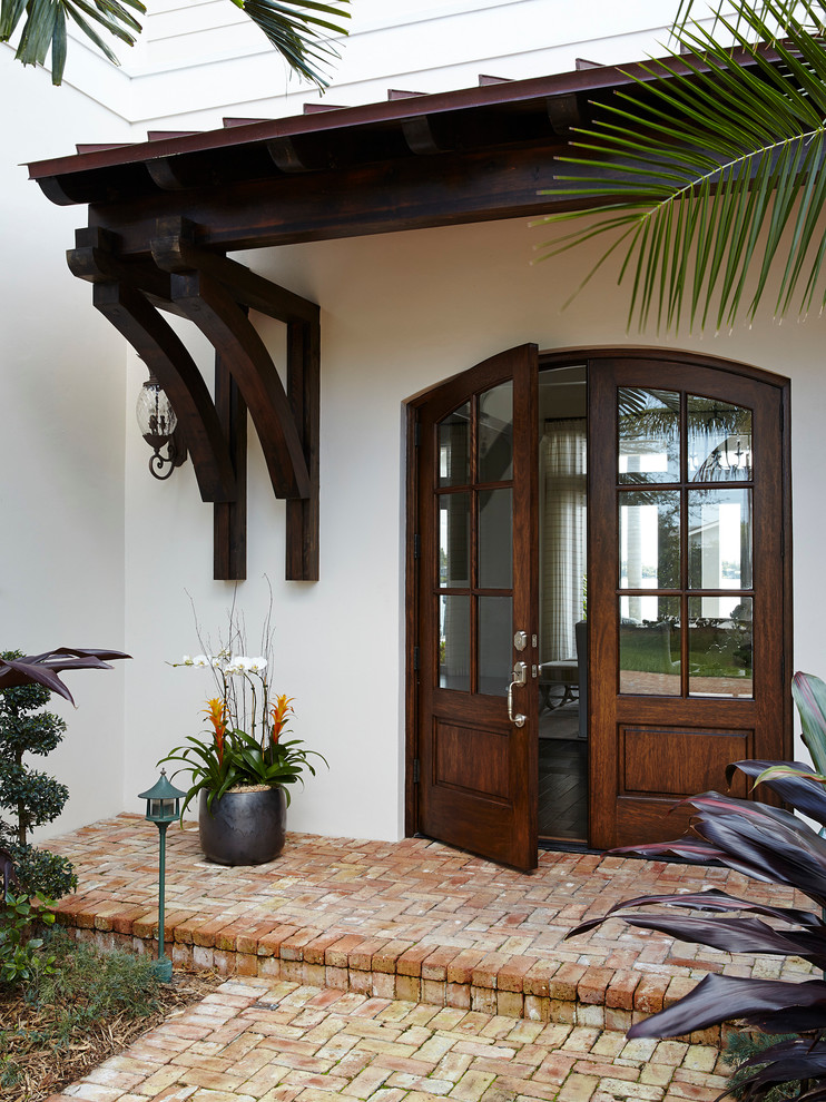 Beach style entryway photo in Miami