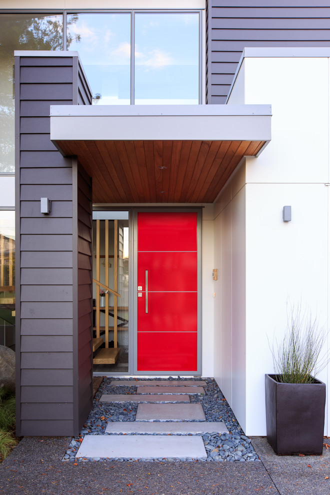Mittelgroße Moderne Haustür mit schwarzer Wandfarbe, Keramikboden, Einzeltür und roter Haustür in Hamilton