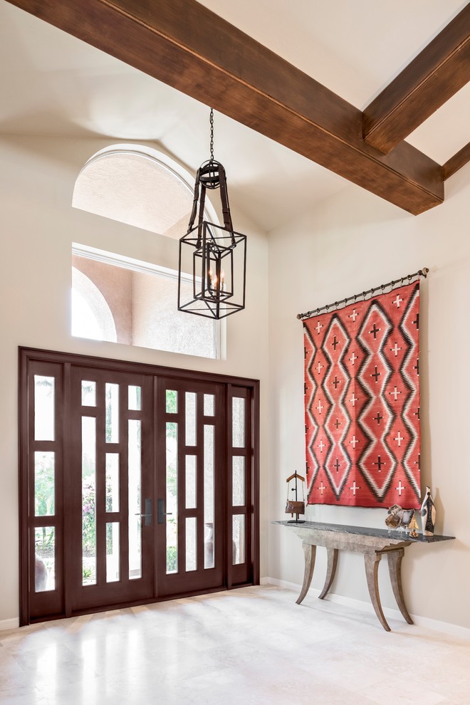 Inspiration for a large traditional foyer in Miami with beige walls, porcelain flooring, a double front door, a dark wood front door and white floors.