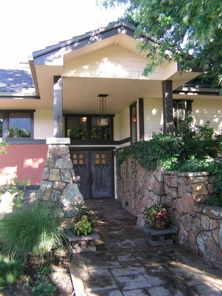 Example of an arts and crafts entryway design in Denver