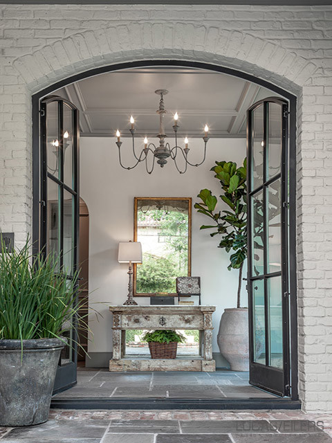 Inspiration for a large classic foyer in Houston with grey walls, slate flooring, a double front door, a metal front door and grey floors.