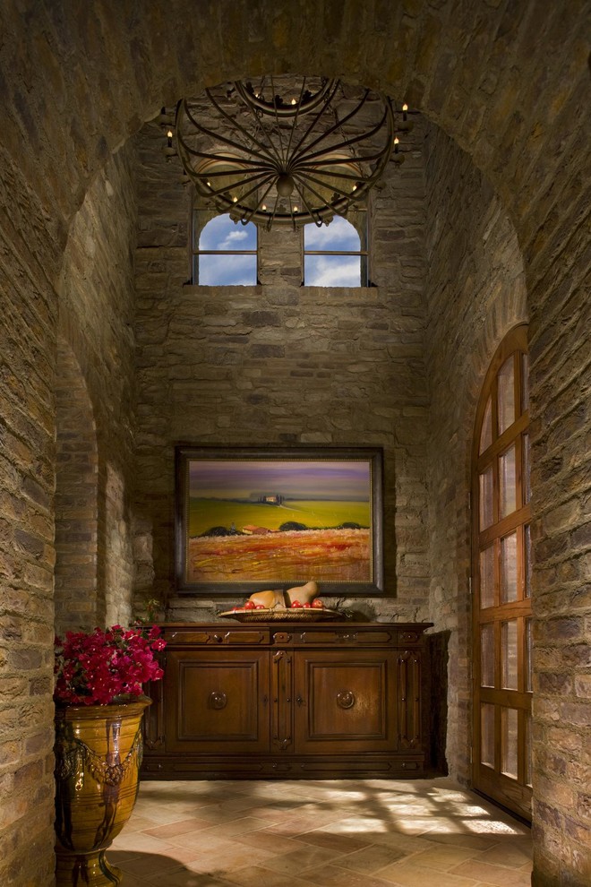 Inspiration for a mediterranean hallway in San Diego with a single front door and a glass front door.