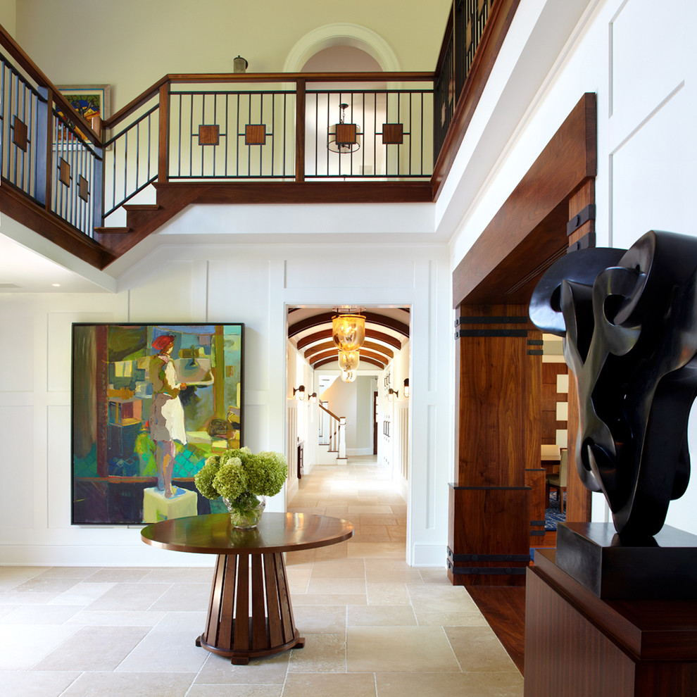Inspiration for a classic foyer in New York with white walls.