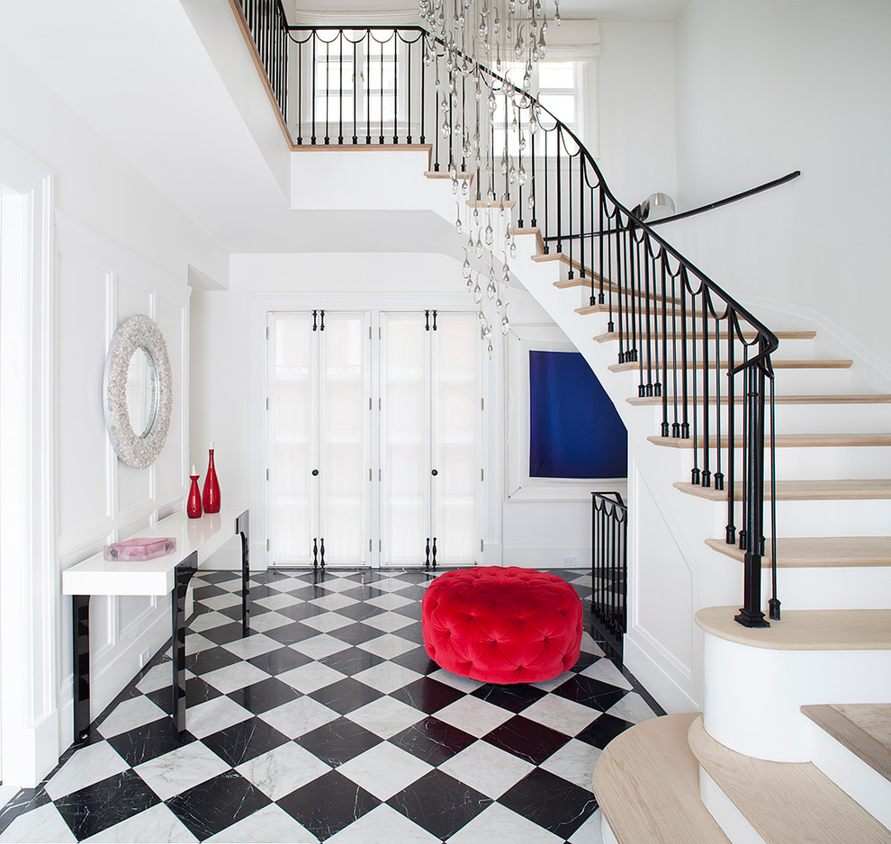 Expansive contemporary foyer in New York with white walls, marble flooring, a single front door, a metal front door and multi-coloured floors.