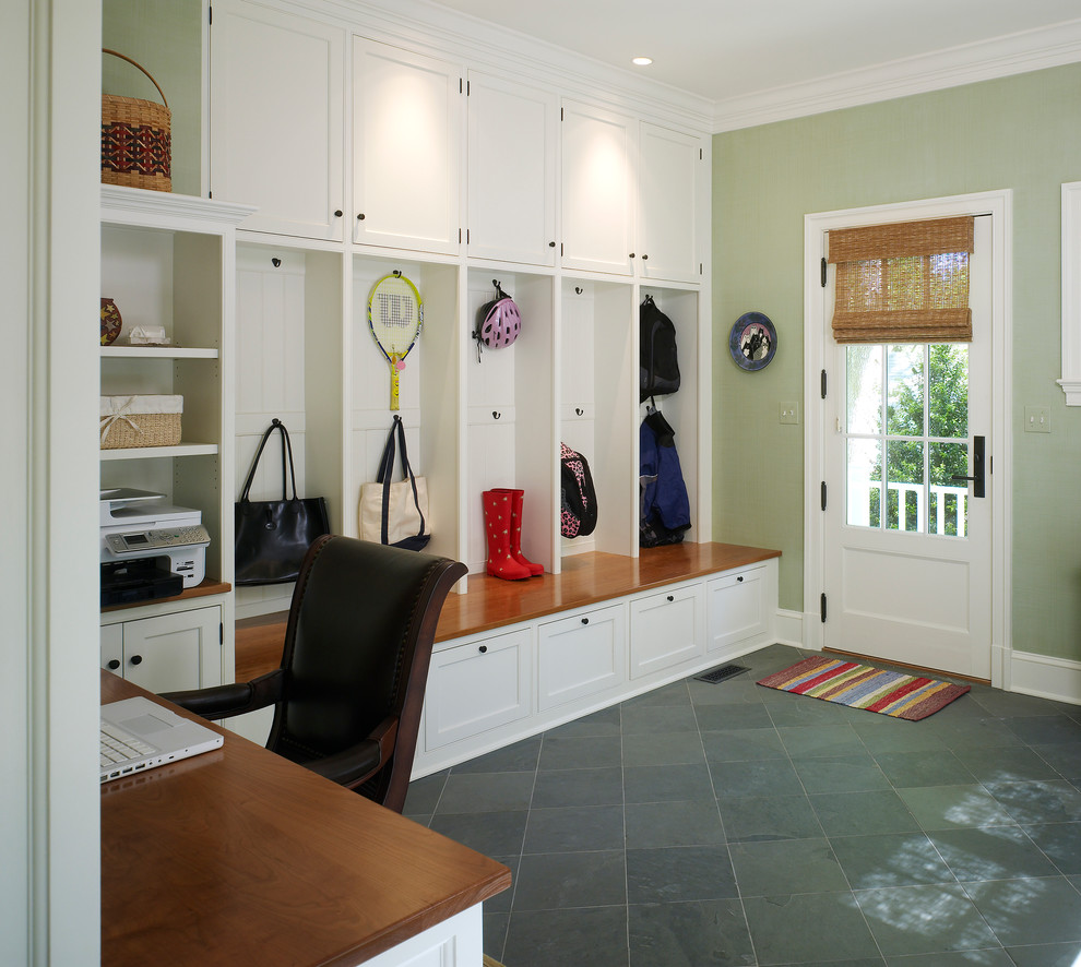 Design ideas for a medium sized traditional boot room in DC Metro with green walls, slate flooring, a single front door, a white front door and black floors.