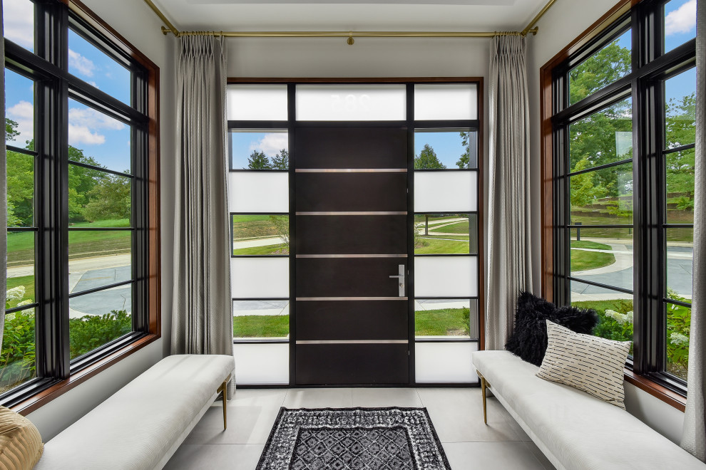 Diseño de puerta principal moderna grande con paredes marrones, suelo de terrazo, puerta simple, puerta de madera oscura y suelo beige