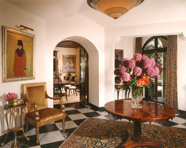 Example of a classic marble floor vestibule design in Los Angeles with beige walls