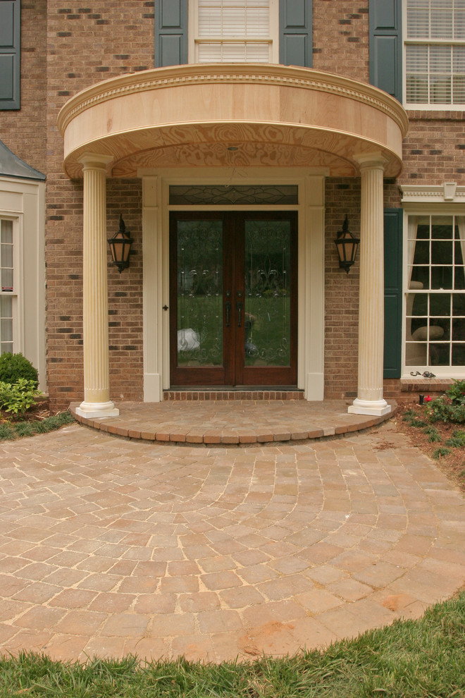 Inspiration for a traditional front door in Atlanta with a double front door and a glass front door.