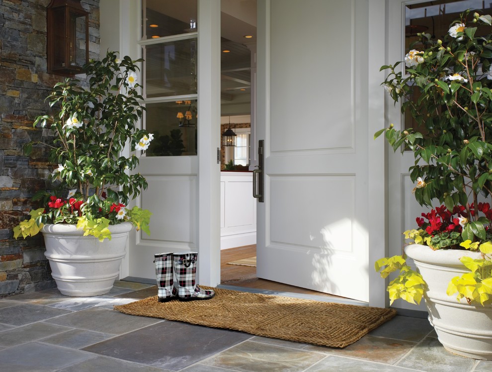 Elegant single front door photo in Orange County with a white front door