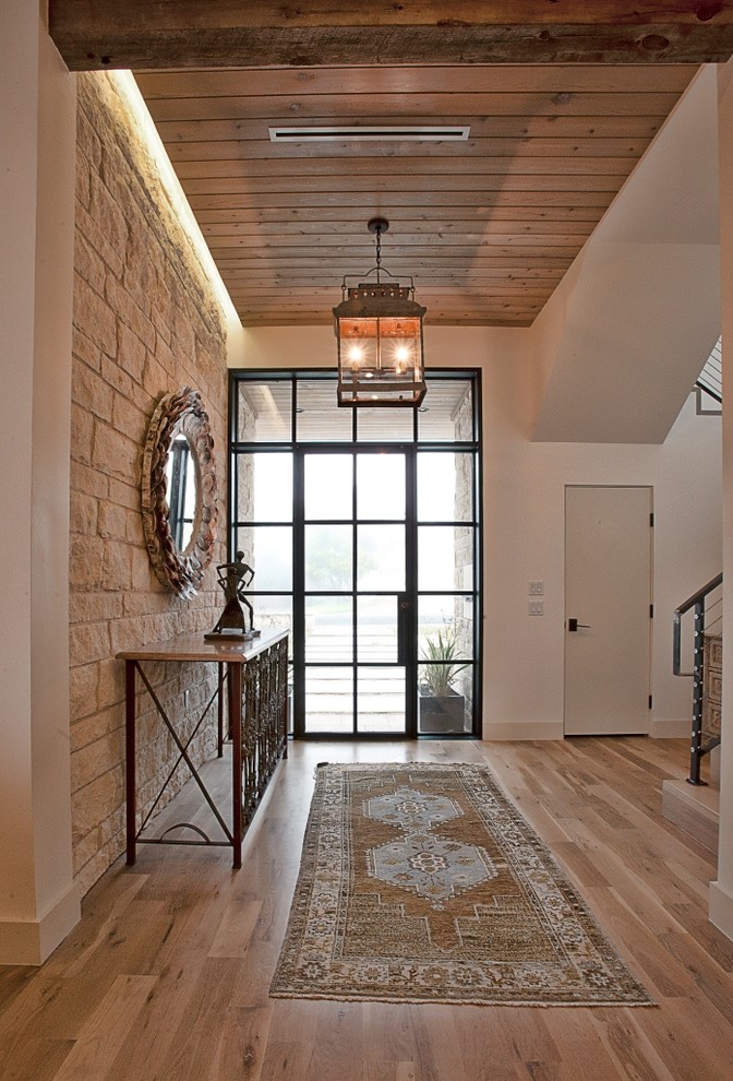 Inspiration for a transitional entryway remodel in Austin