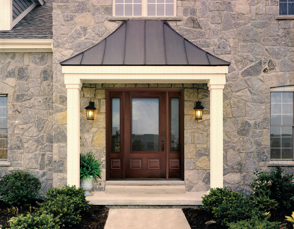 Example of a mid-sized transitional ceramic tile entryway design in Tampa