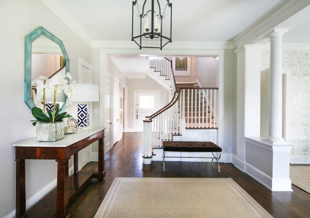 Inspiration for a medium sized contemporary foyer in Philadelphia with beige walls, dark hardwood flooring, a single front door and a white front door.