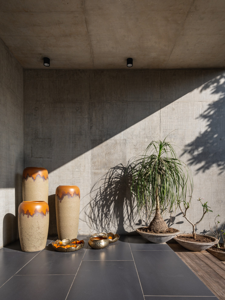 Inspiration for a contemporary entryway remodel in Ahmedabad