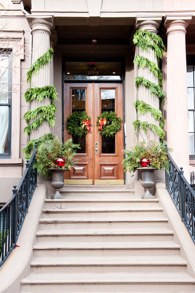 Inspiration for a timeless front door remodel in Boston with a medium wood front door