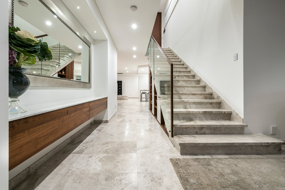 Mid-sized limestone floor entryway photo in Perth with white walls