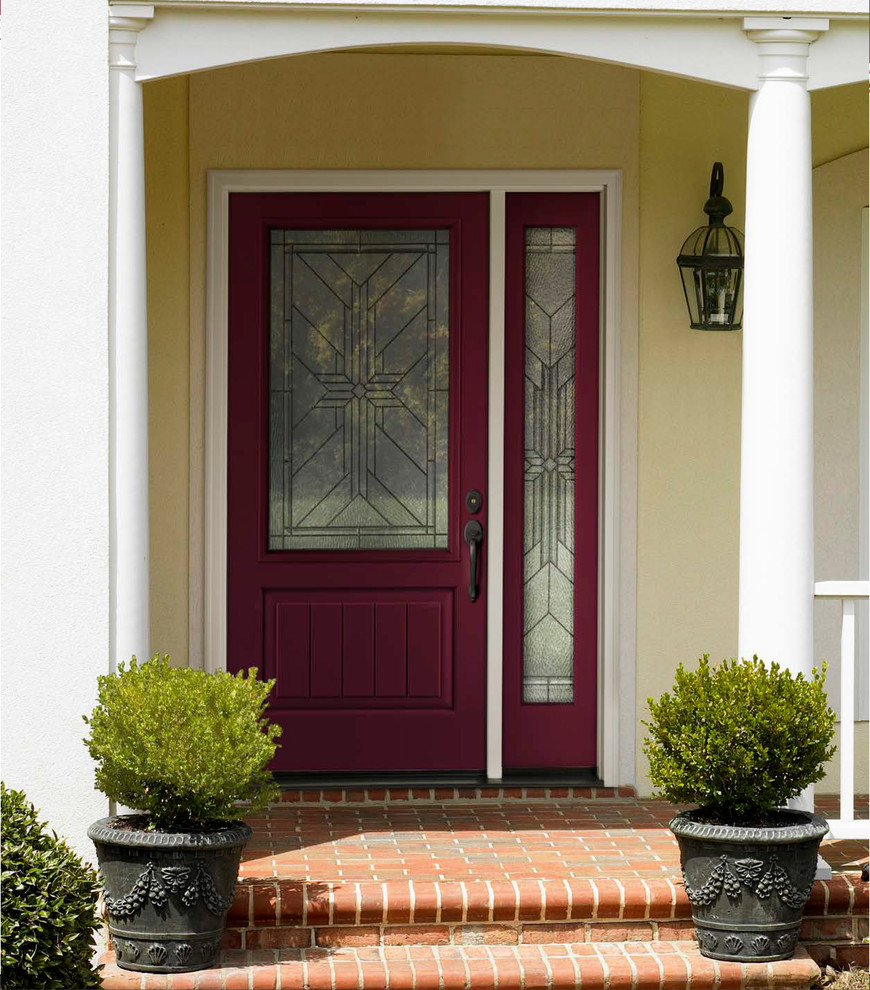 Inspiration for a mediterranean front door in Other with a single front door and a red front door.