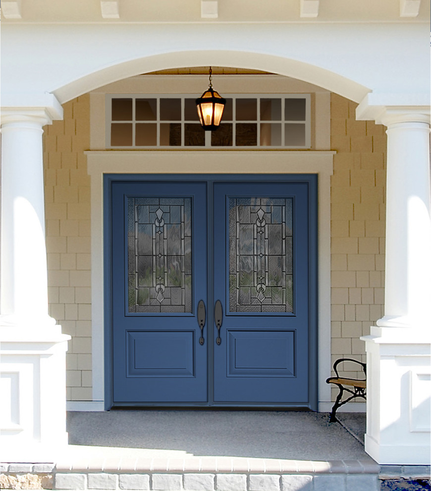Bild på en vintage ingång och ytterdörr, med en dubbeldörr och en blå dörr