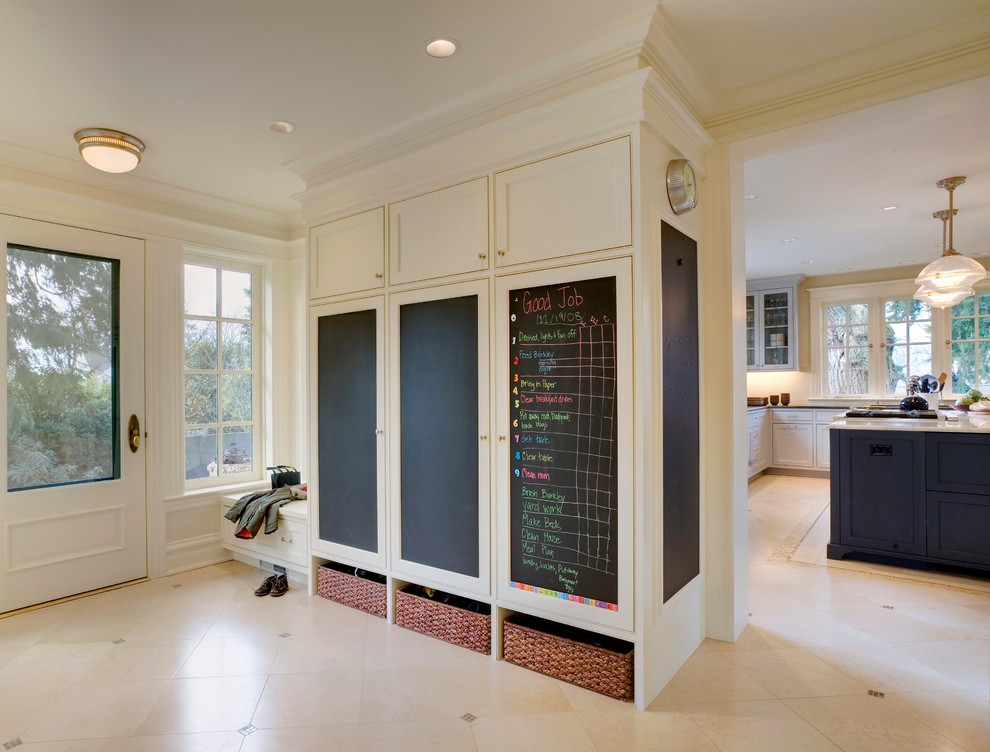 Entryway - traditional beige floor entryway idea in Seattle with a glass front door