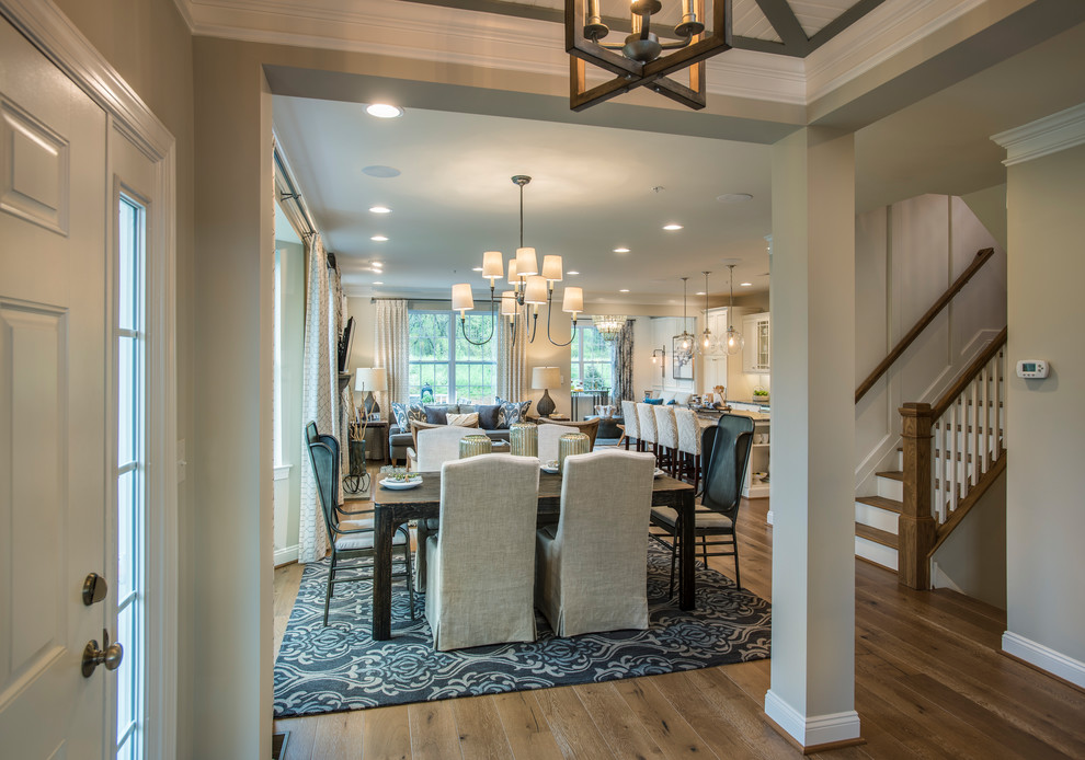 Example of a mid-sized transitional light wood floor dining room design in Philadelphia with gray walls