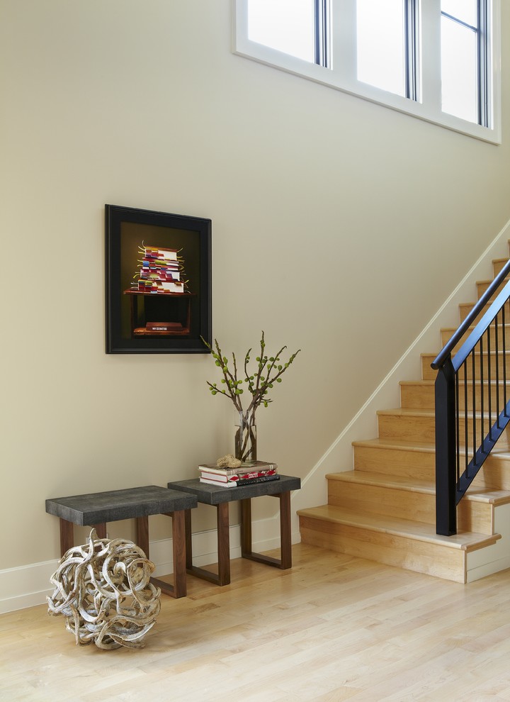 Inspiration for a contemporary foyer in Dallas with beige walls.