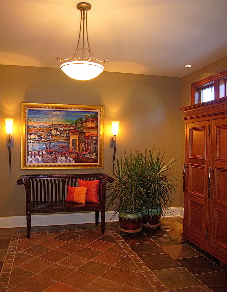 Example of a trendy slate floor entryway design in Other