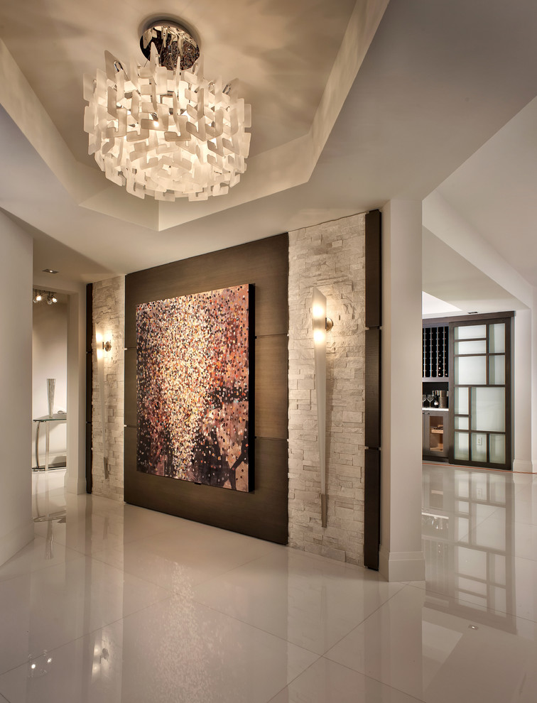 Trendy foyer photo in Miami with white walls